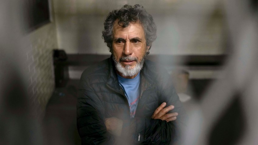 Aler Baldomero Samayoa, alleged leader of ‘Los Huistas’ drug cartel sits on a jail of a court house in Guatemala city on March 12, 2025. Samayoa, one of the US 100 most wanted men, captured in Mexico and transferred to Guatemala on March 12, 2025, was taken to court to begin extradition proceedings to the US, to face charges of “conspiracy to distribute cocaine,” according to the Guatemalan prosecutor’s office. (Photo by EDWIN BERCIÁN / AFP) (Photo by EDWIN BERCIAN/AFP via Getty Images)